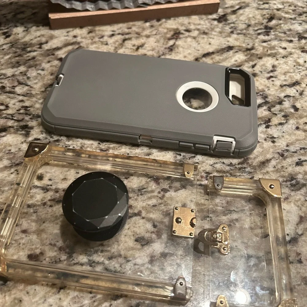 A pair of iPhone 8 Plus covers
